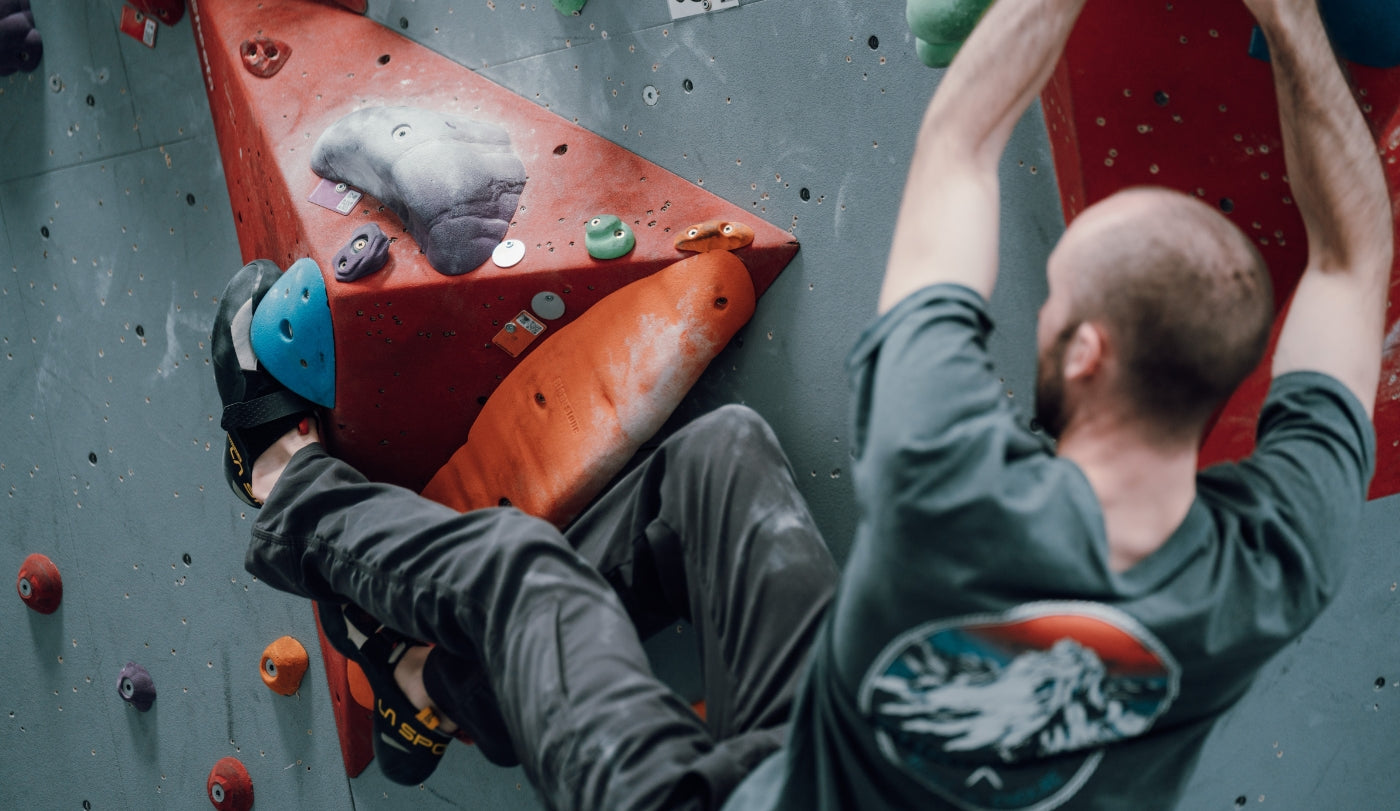 Rock Climbing Shoe size guide. Image of a climber