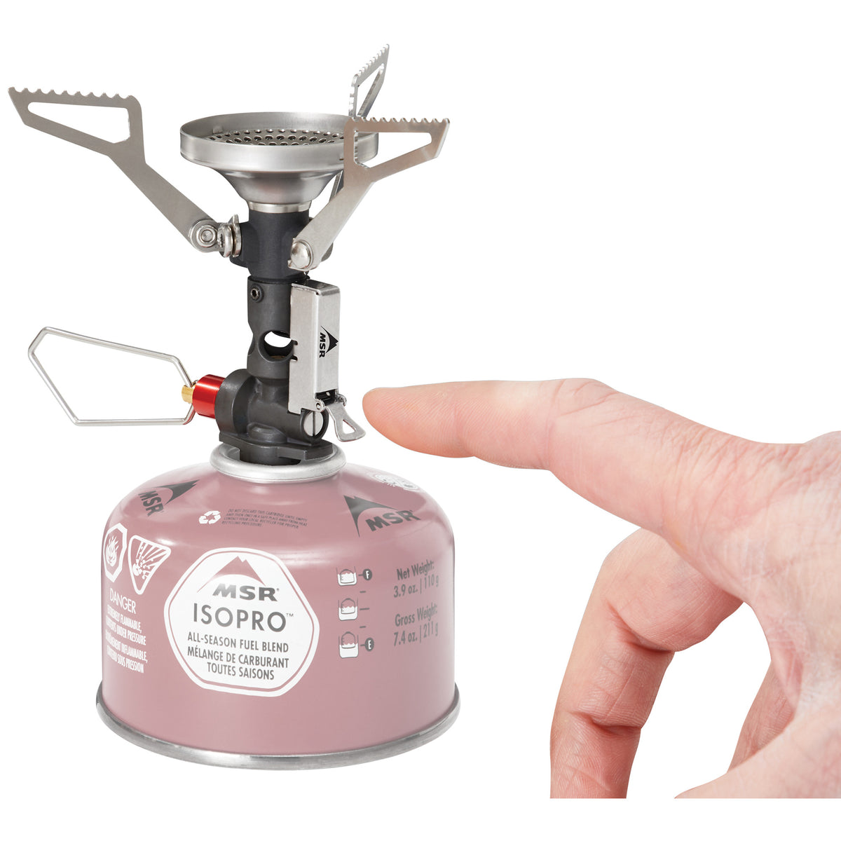 MSR Pocket Rocket Deluxe camping stove, shown next to hand for size comparisson