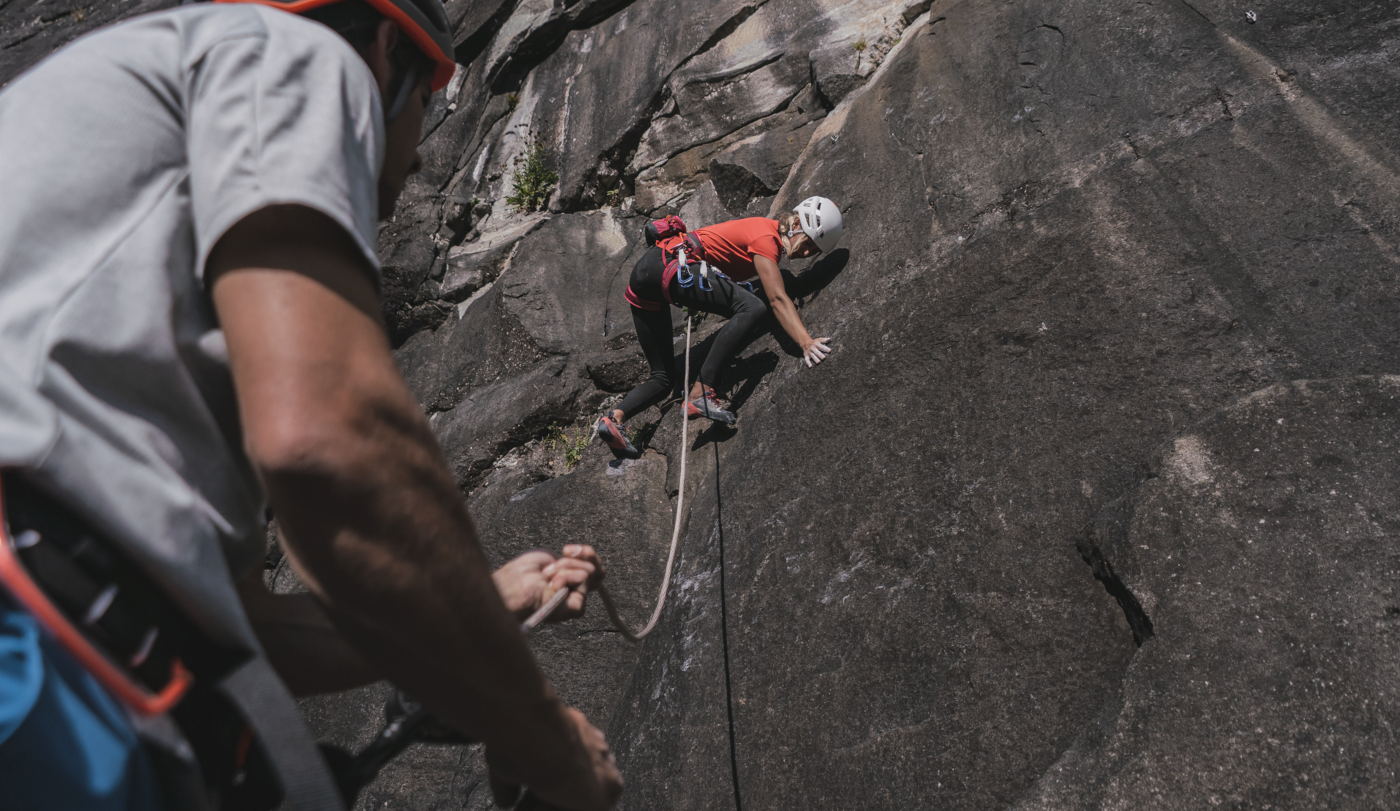 belaying a lead climber photo