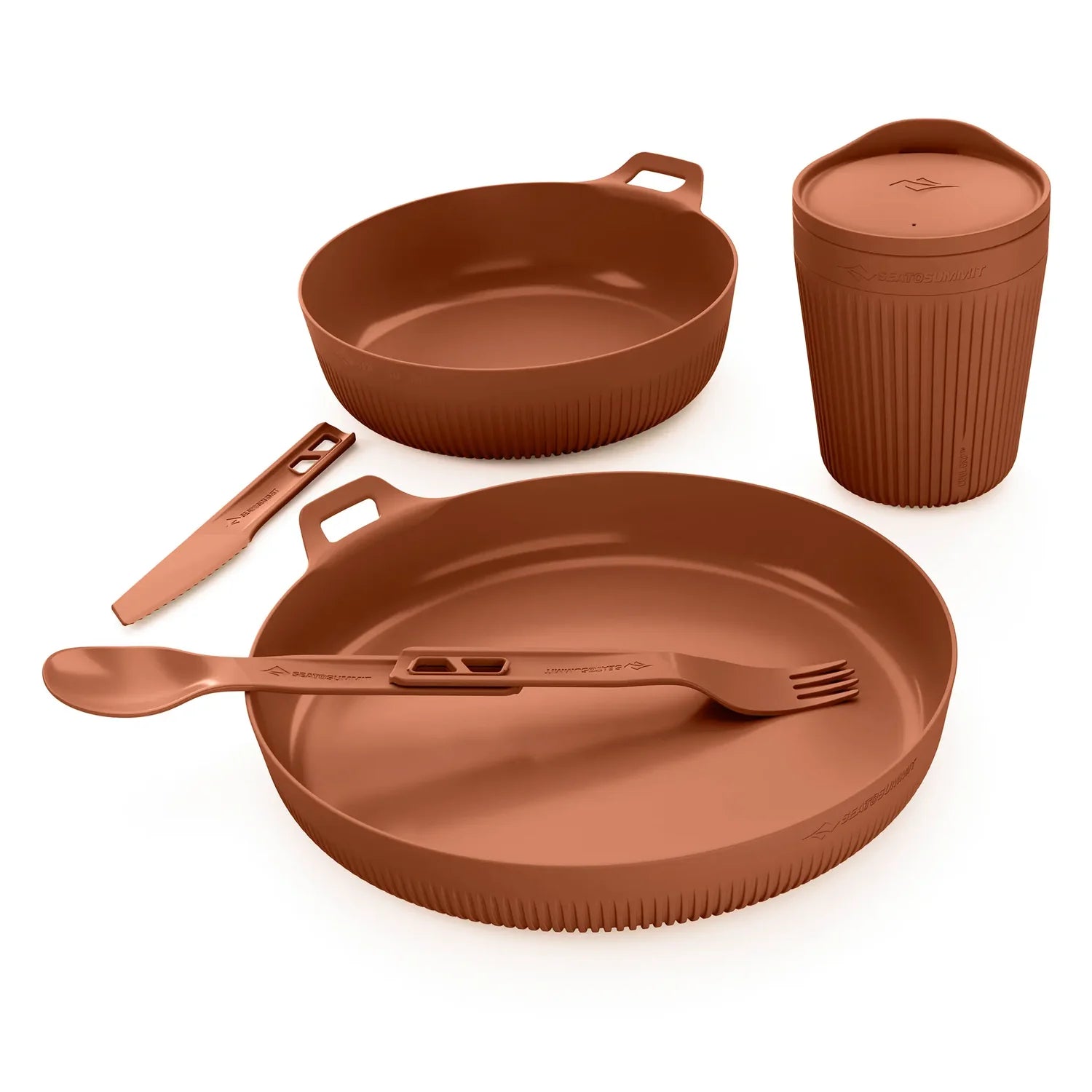 dinnerware set in red on a white background