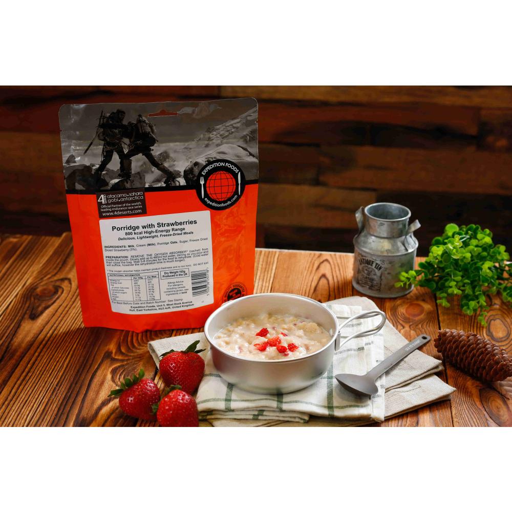 Expedition Foods Porridge with Strawberries pack, shown next to bowl of food on table