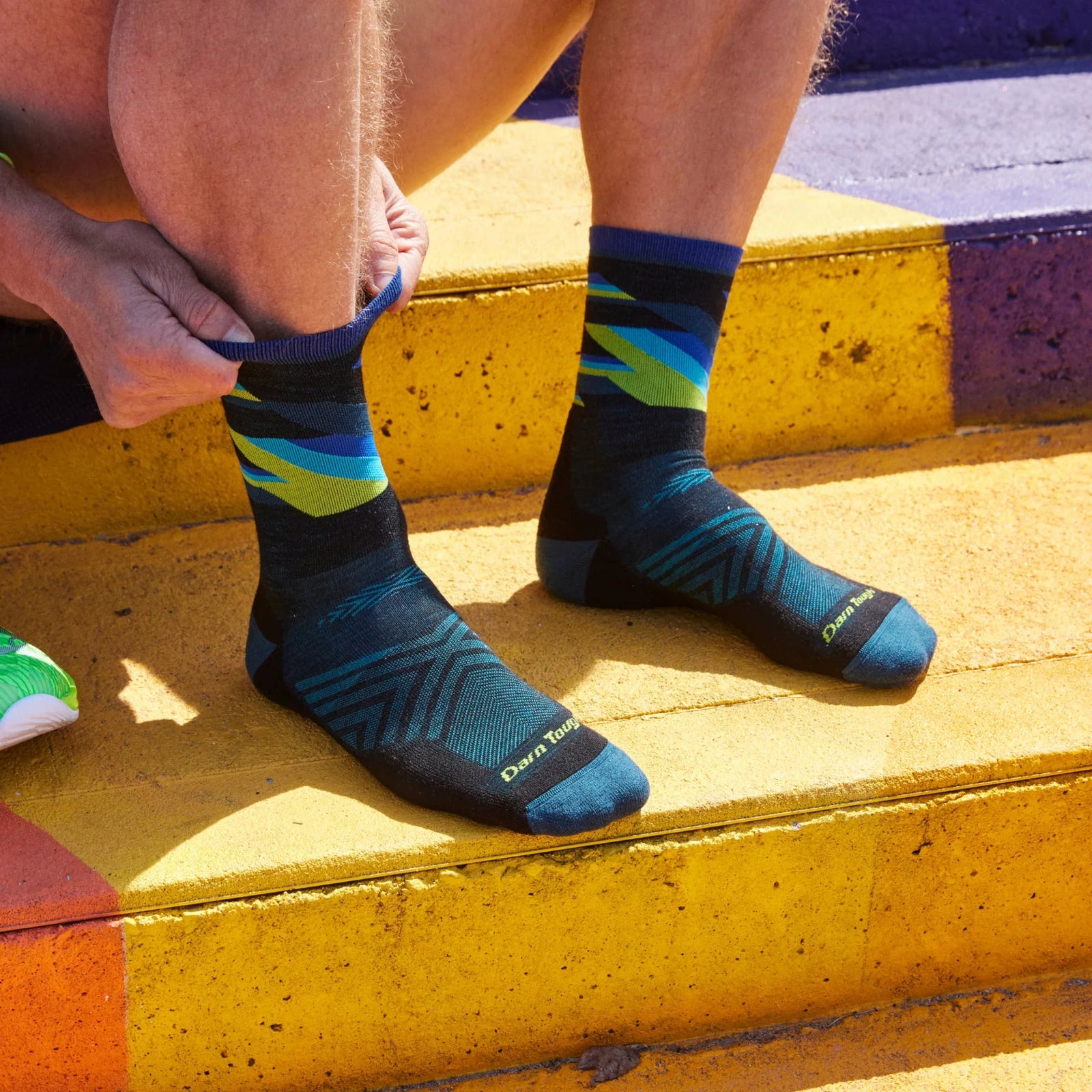 Darn Tough Men's Bolt Micro Crew Ultra-Lightweight Running Sock in black with bolt pattern