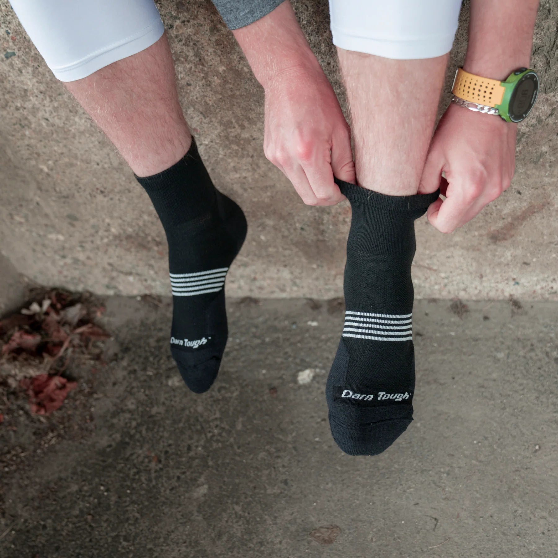 Darn Tough Men's Element 1/4 Lightweight Running Sock in black with white stripes