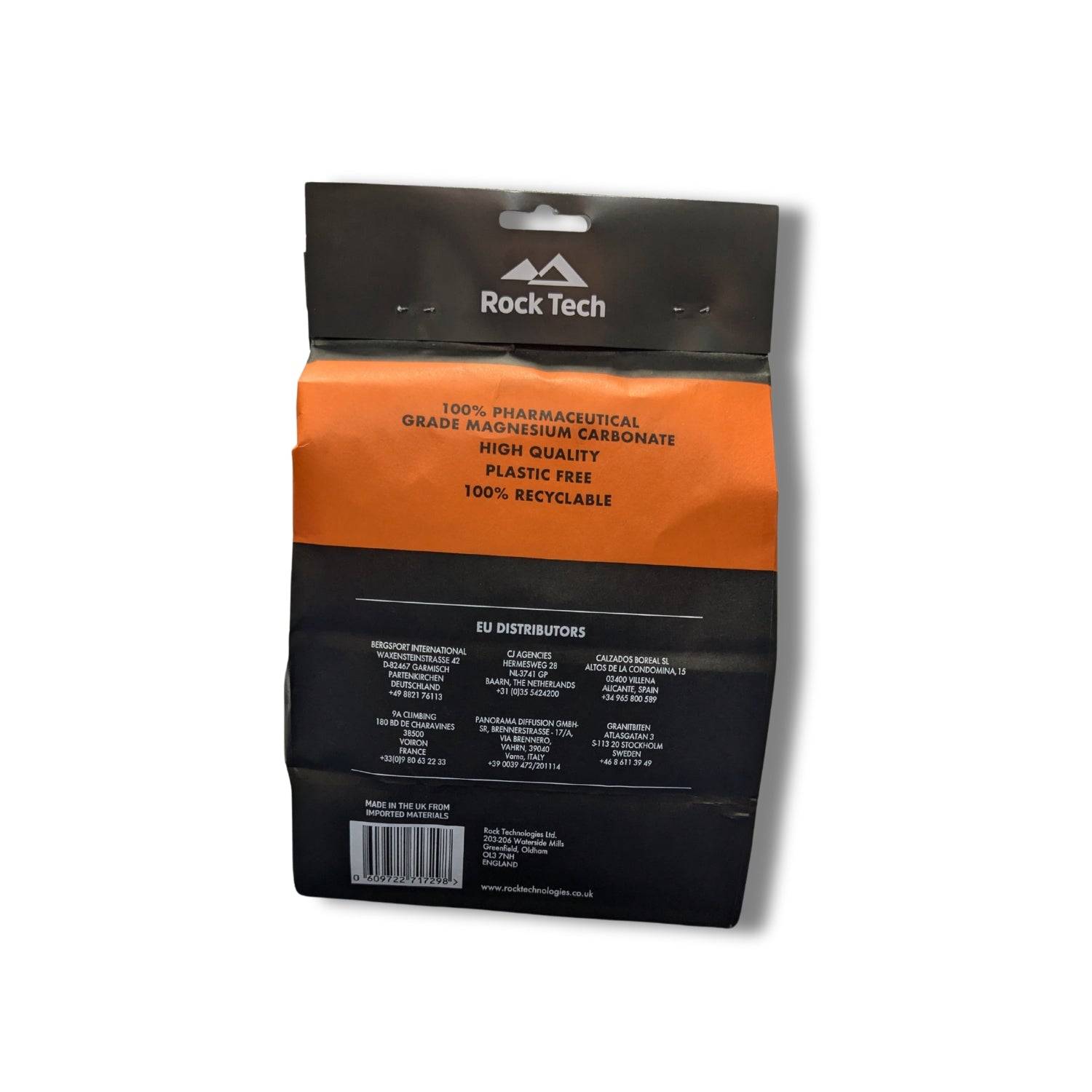 A package of Rock Technologies MAG Orange Chalk 300g. The package is predominantly black and orange with a hand print graphic and product information.