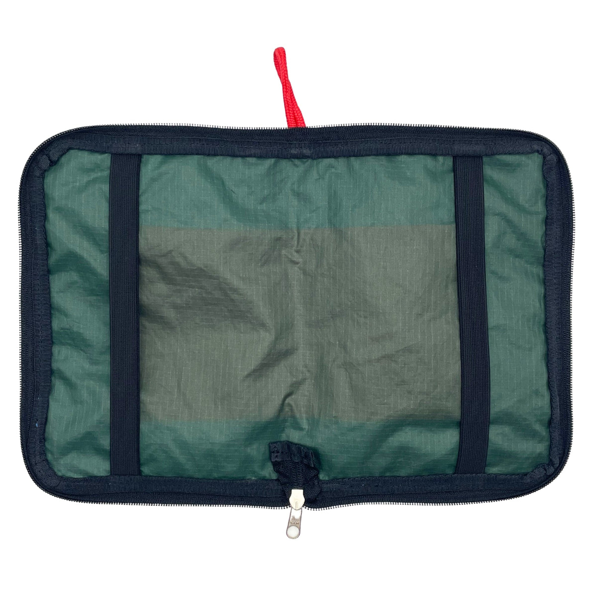 Green and navy travel organizer with a red pull tab on a white background