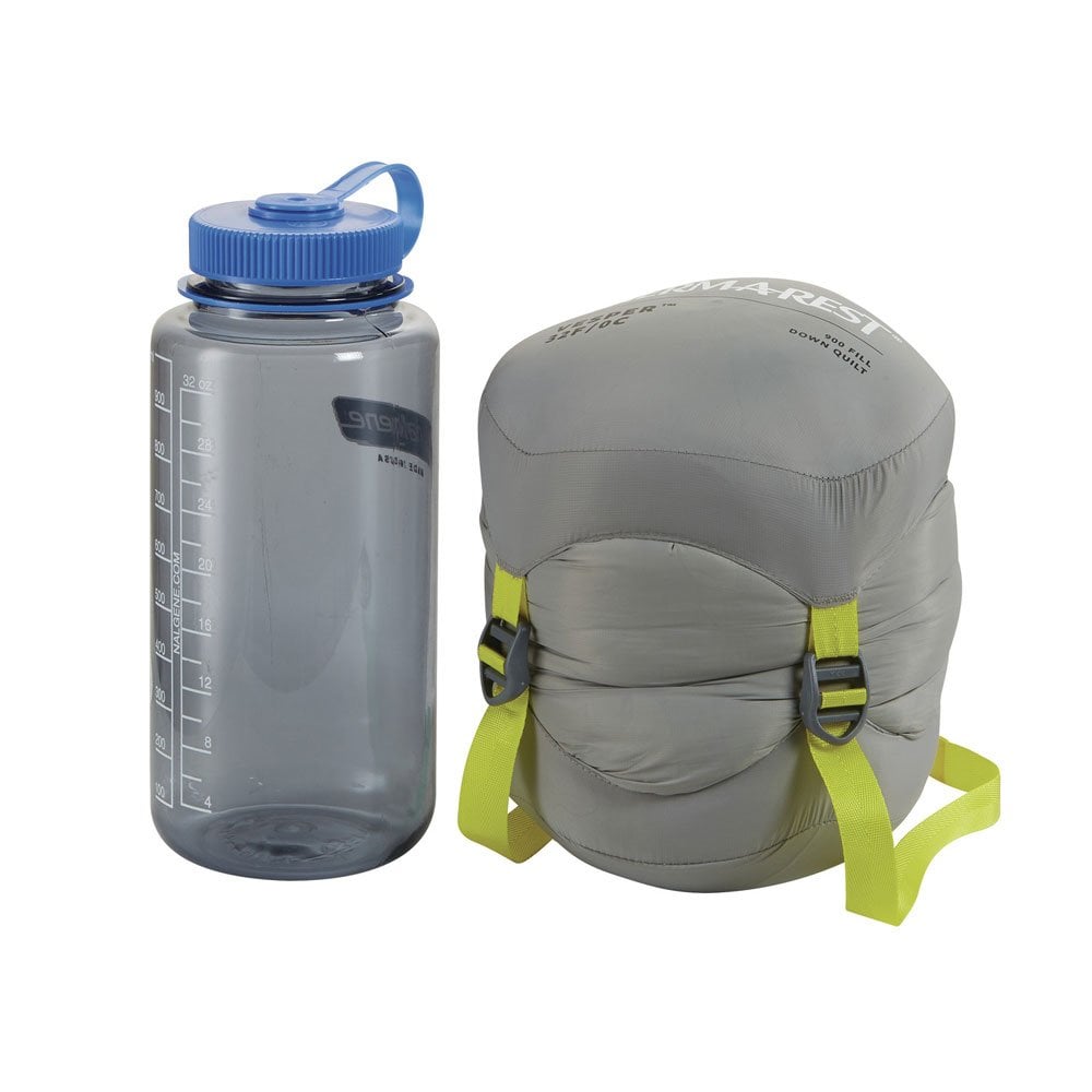 Thermarest Vesper 32F/0C quilt showing it compressed next to nalgene