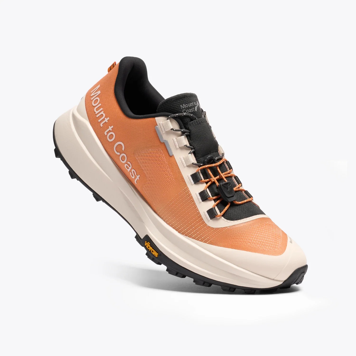 Orange and beige sneaker with black accents on a white background