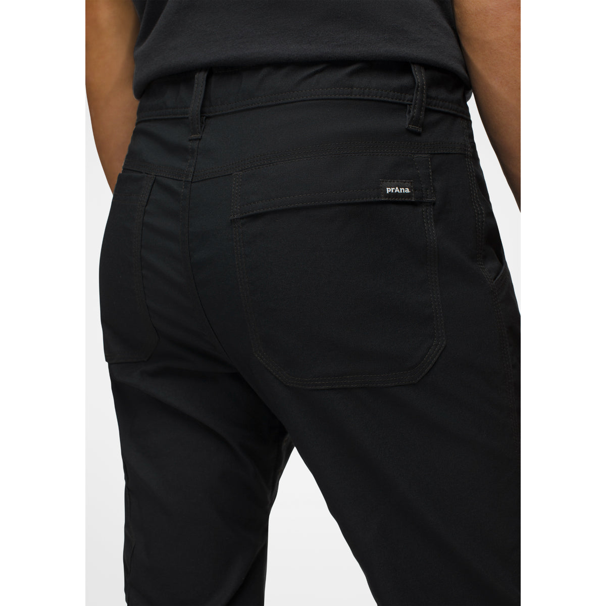Black pants with a brand logo on a white background