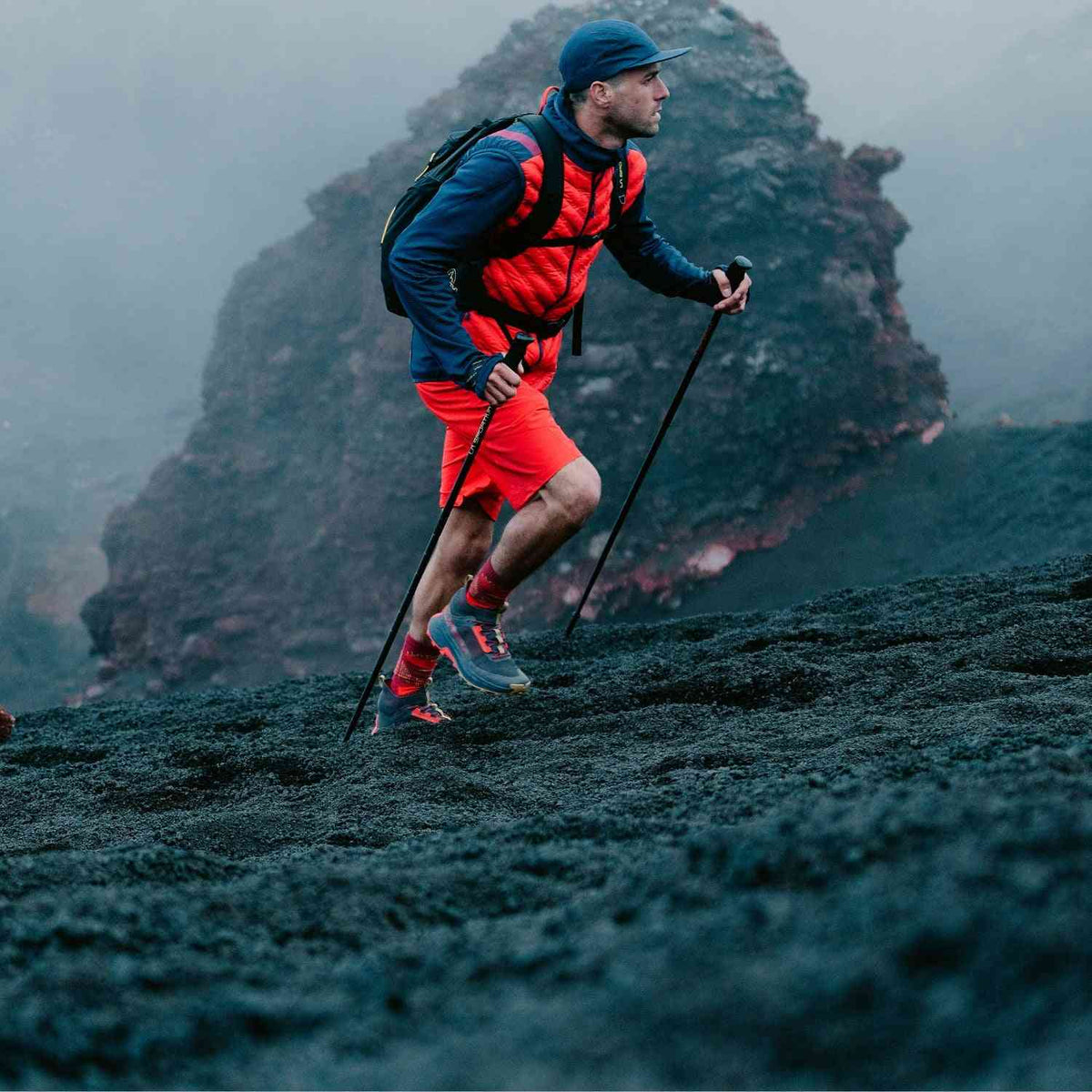 La Sportiva Prodigio Hike GTX - Men's Fast Boots in action on rugged volcanic terrain, showcasing speed hiking performance and GORE-TEX protection.