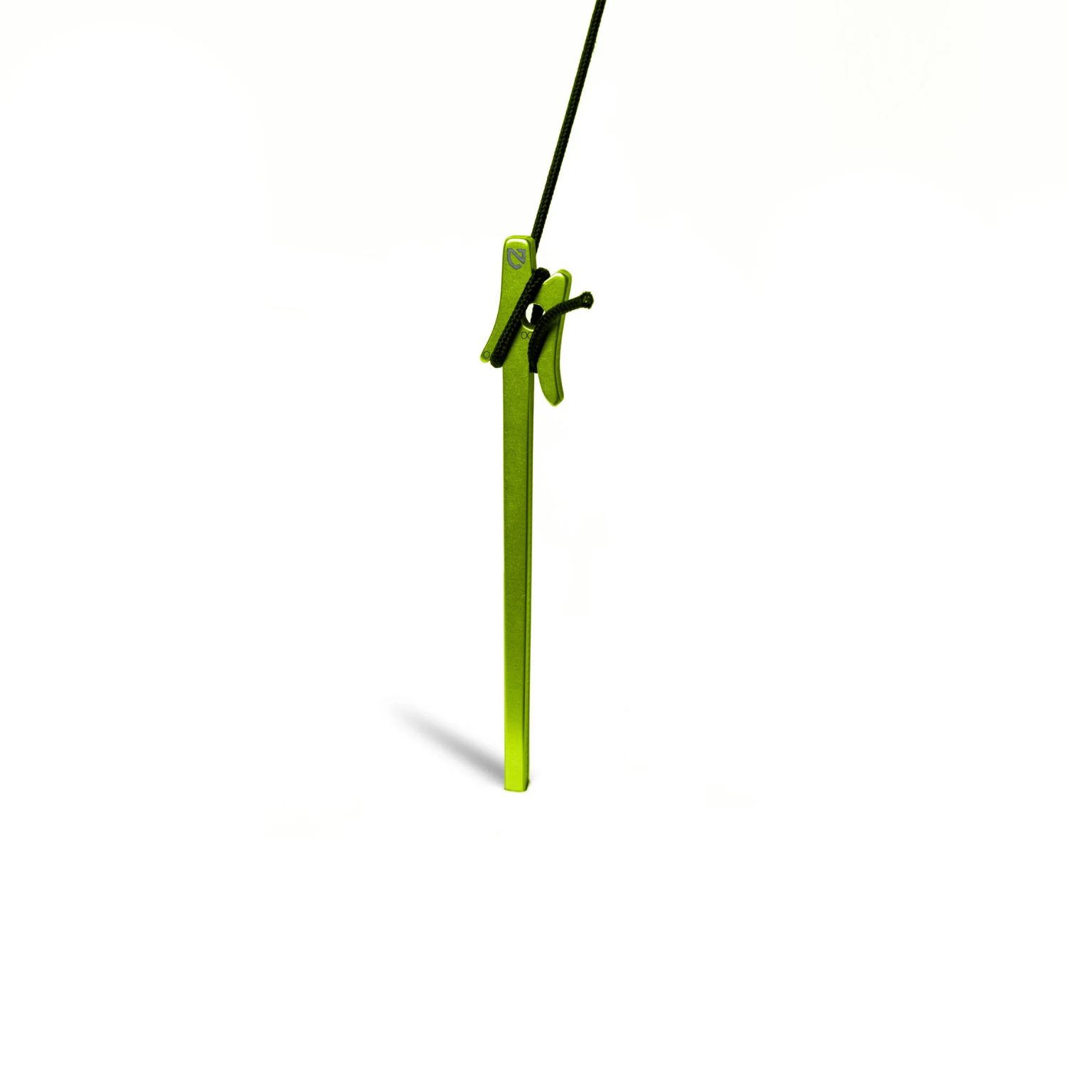 Four green tent stakes on a white background