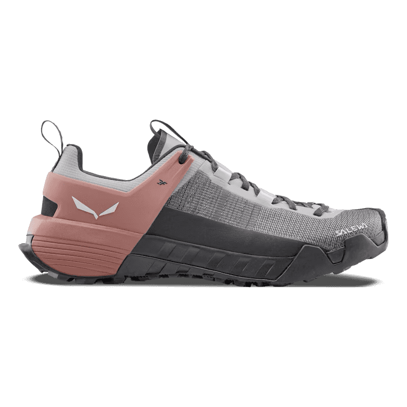 Gray and pink sneaker with brand logo on a transparent background