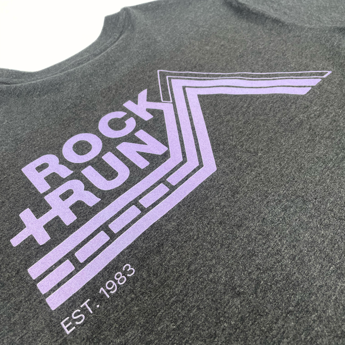 Gray t-shirt with purple 'Rock Run' logo and 'EST. 1983' text