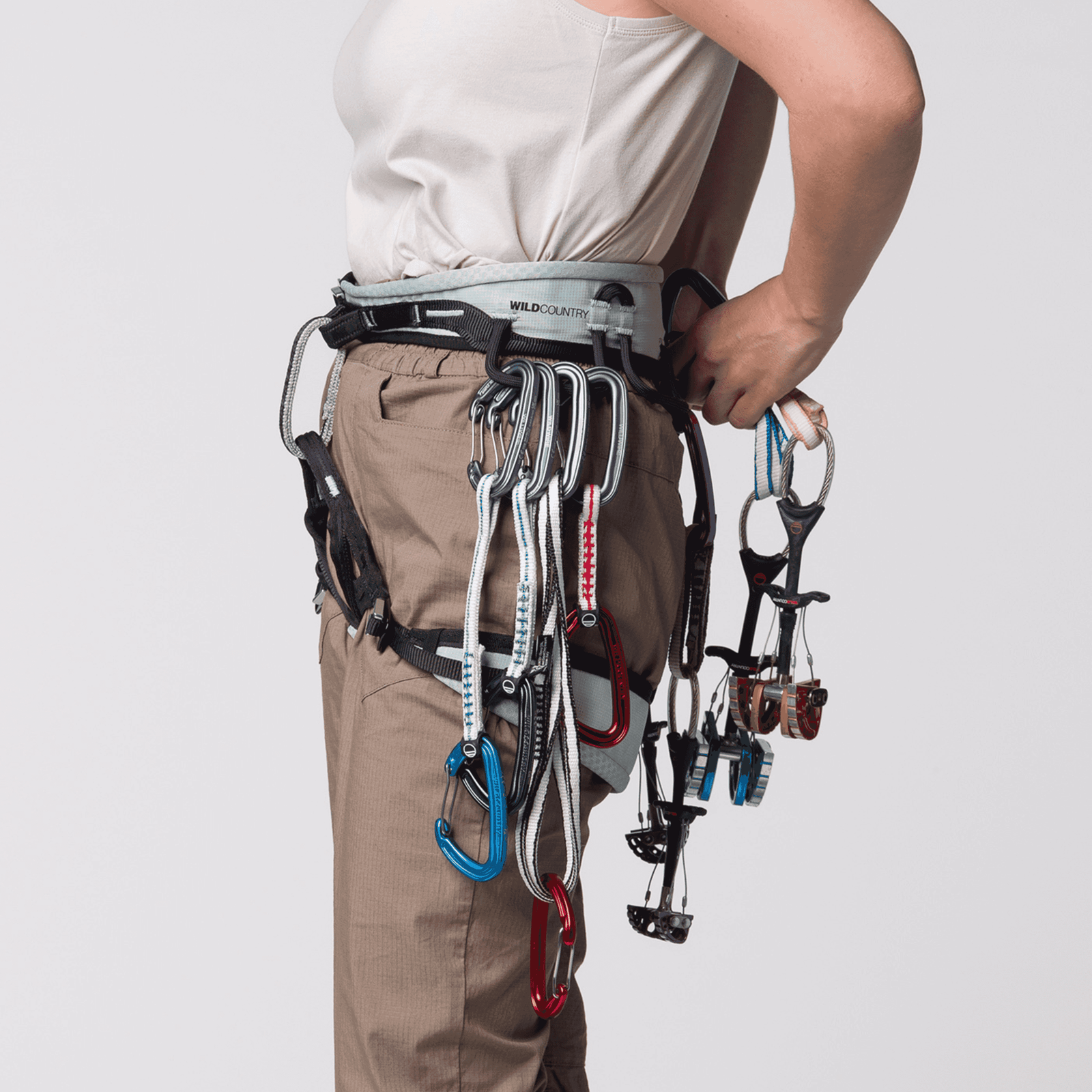Two carabiners with red and black components on a transparent background
