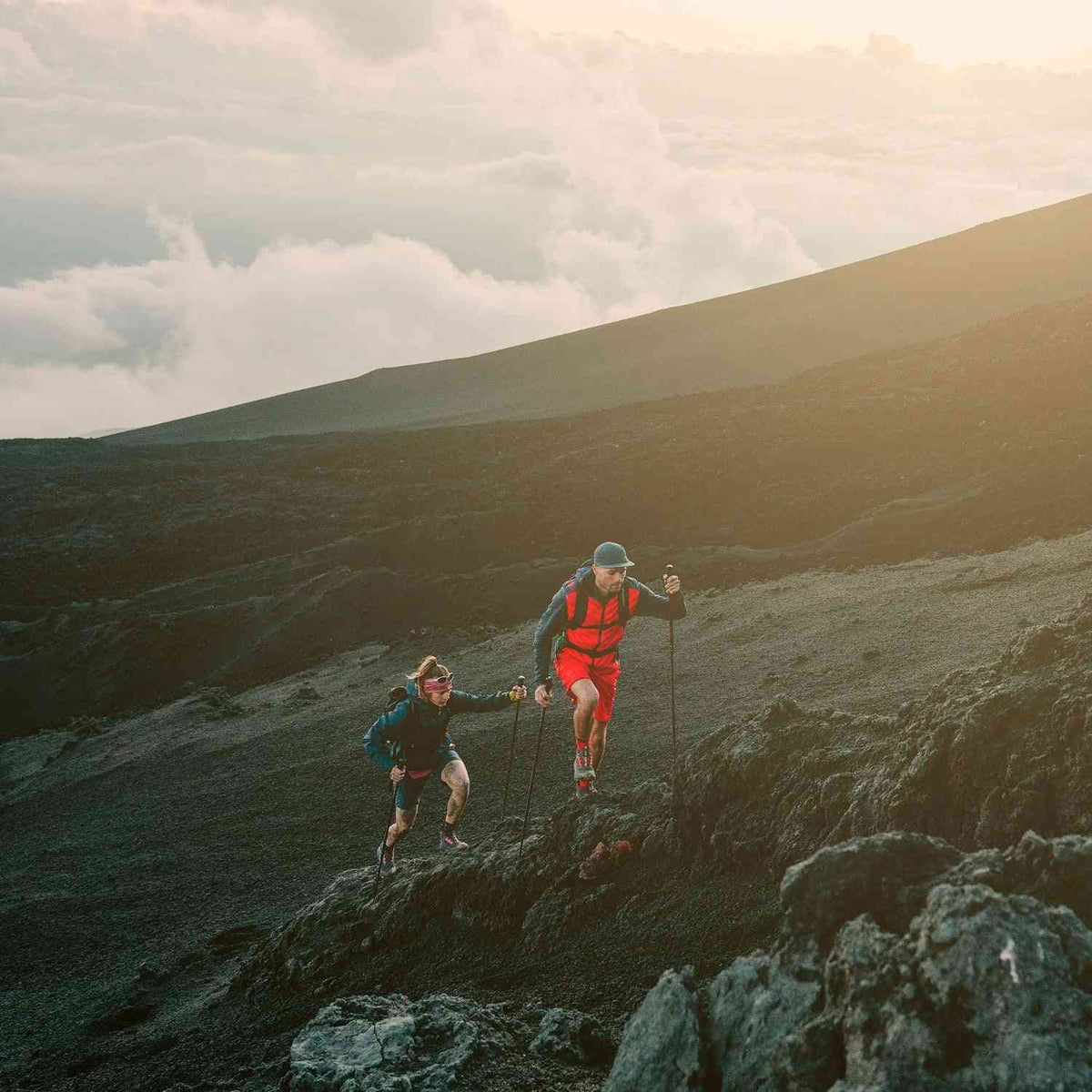 La Sportiva Prodigio Hike GTX - Men's fast hiking boots in action on rugged volcanic terrain, showcasing speed, grip, and GORE-TEX protection.