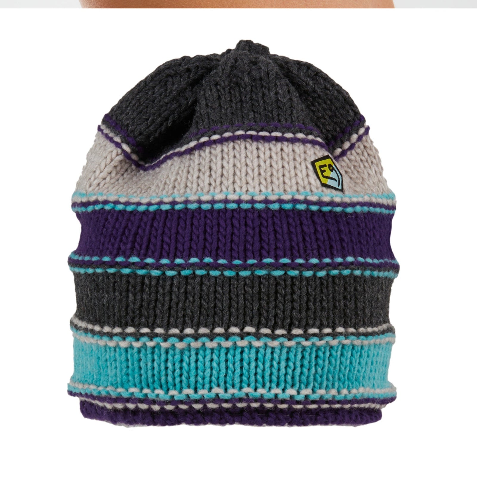Knitted beanie with striped pattern on a white background