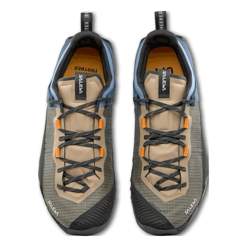 Pair of hiking shoes with beige and gray design on a transparent background