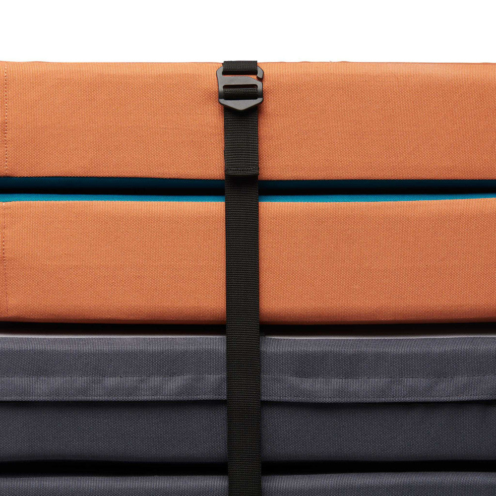 Black Diamond Circuit Crash Pads. folded up. showing straps and buckles for a multi-pad carry