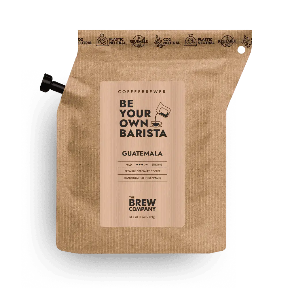 Coffee package with 'Be Your Own Barista' text on a white background