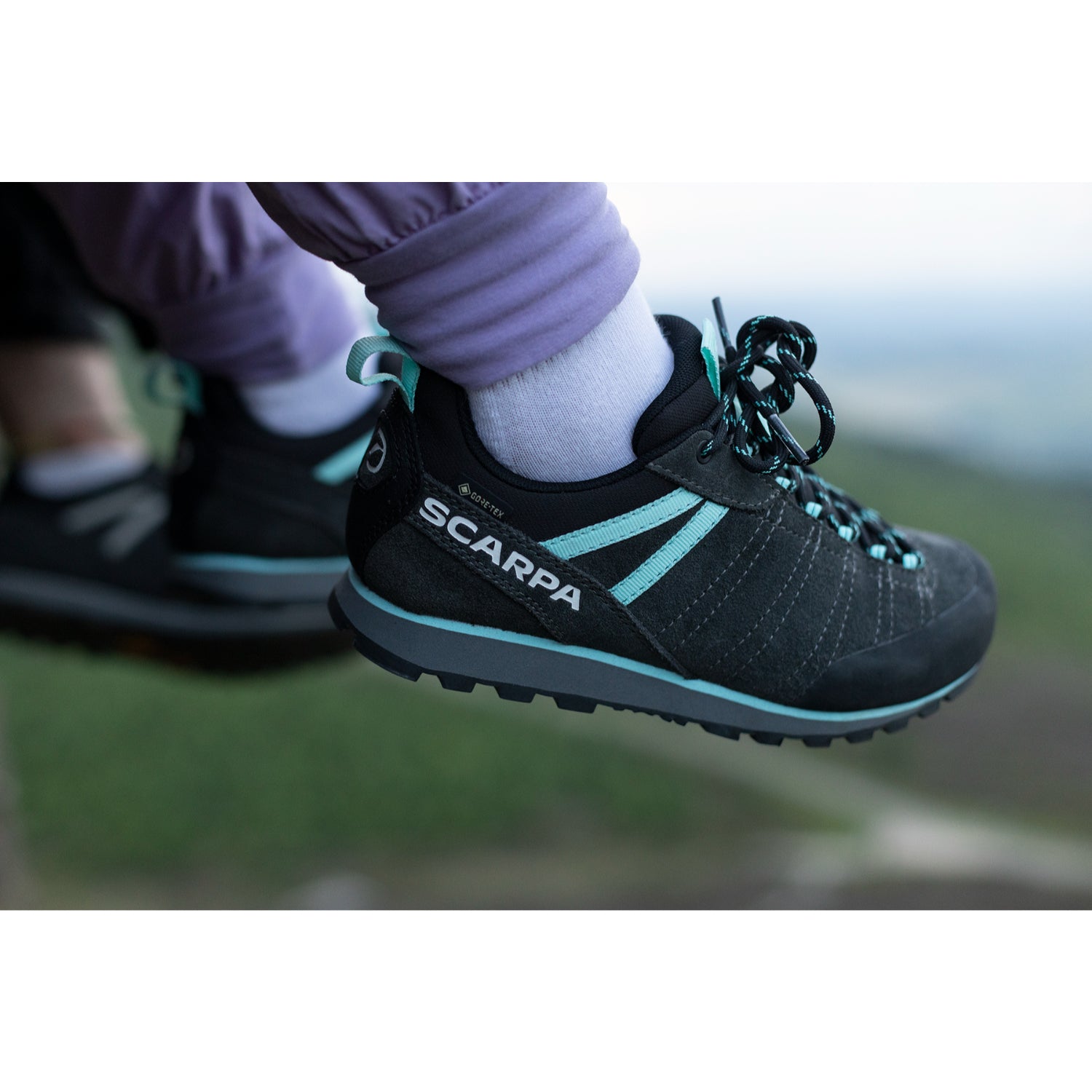 Grey and Aqua approach shoe with 'Scarpa' branding on a white background