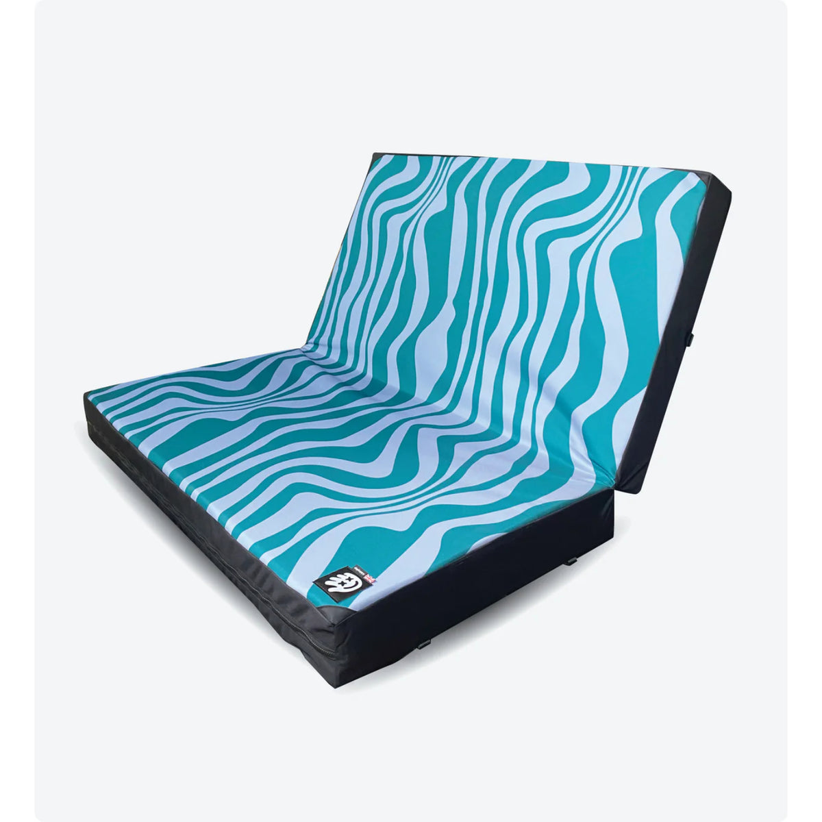 Foldable seat with blue and white wavy pattern on a white background