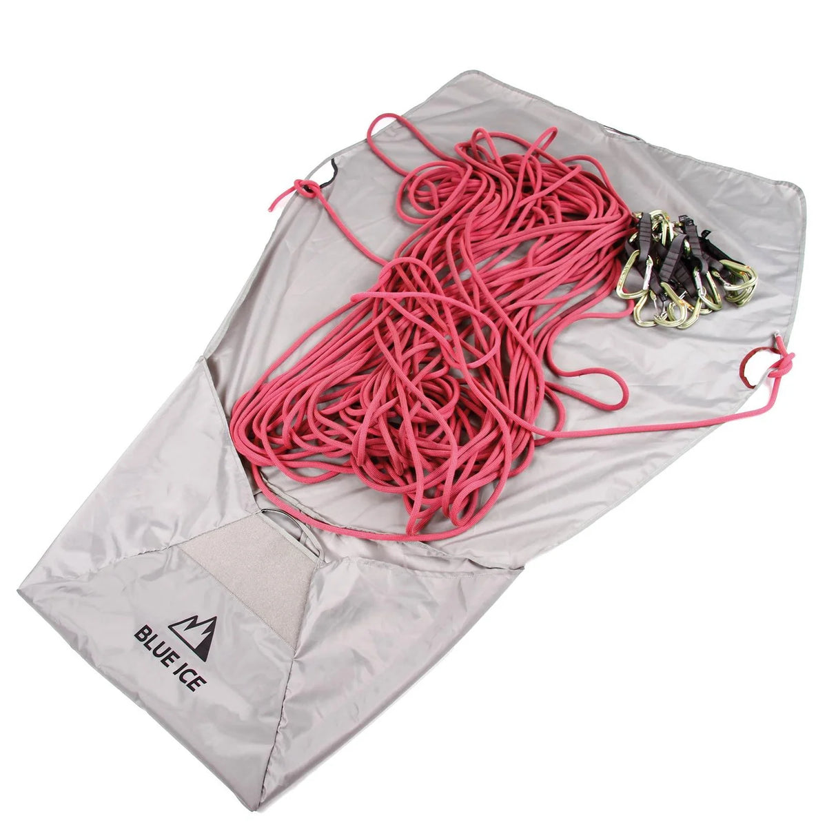 Unfolded rope tarp from Blue Ice Octopus 45L rucksack with climbing rope and carabiners, ideal for keeping gear clean and untangled.