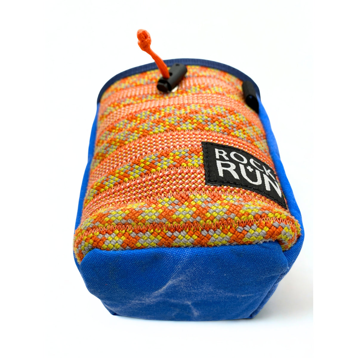 Orange and blue rock climbing chalk bag with 'Rock Run' label on a white background