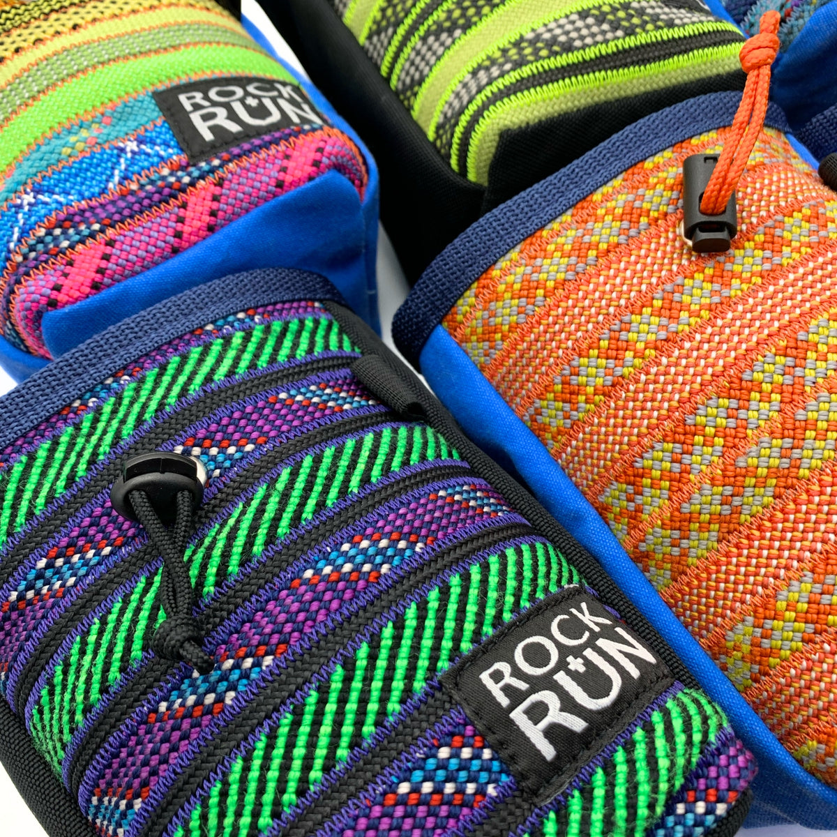 Colorful climbing shoes with 'Rock Run' branding on a white background