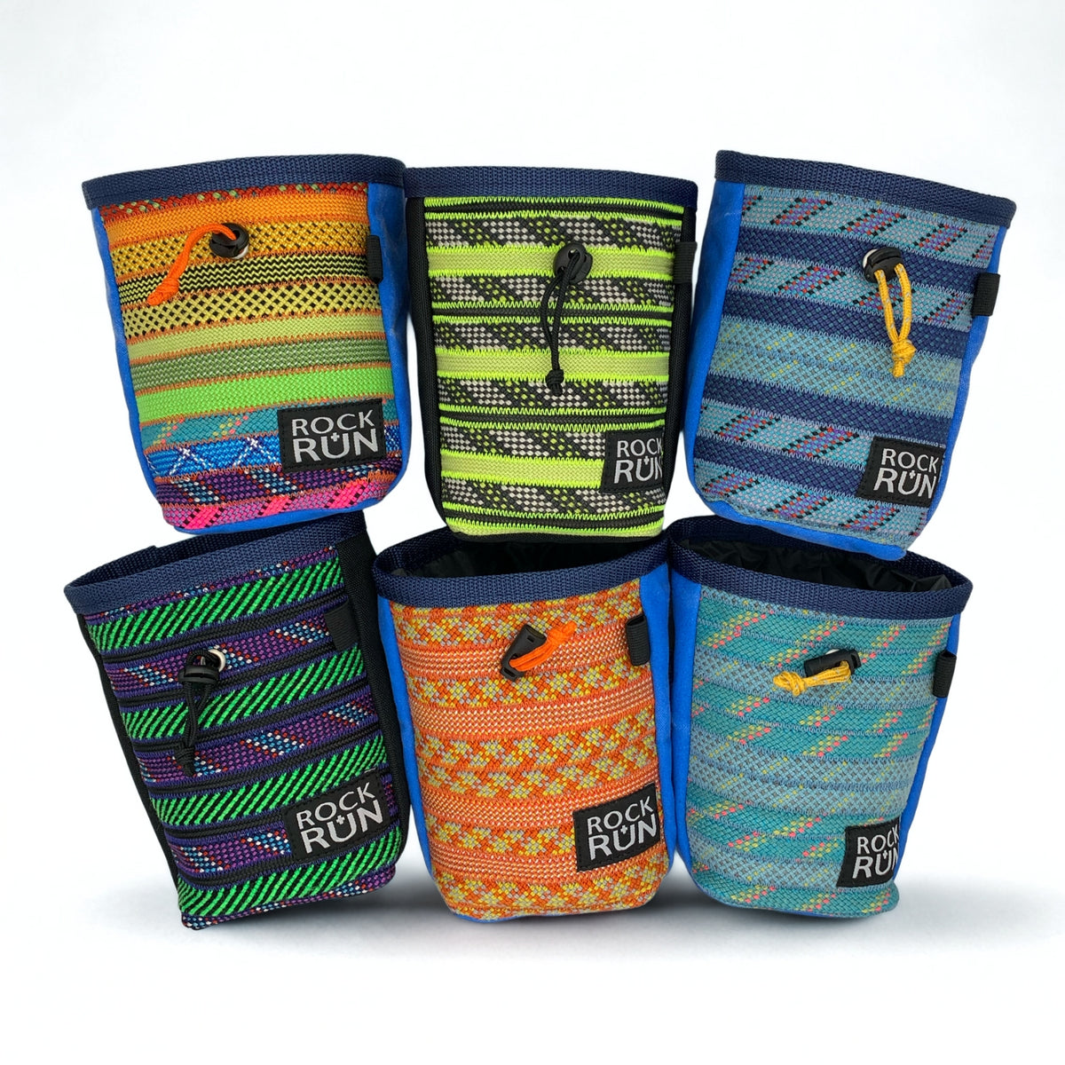 Five colorful chalk bags with 'Rock Run' branding on a white background