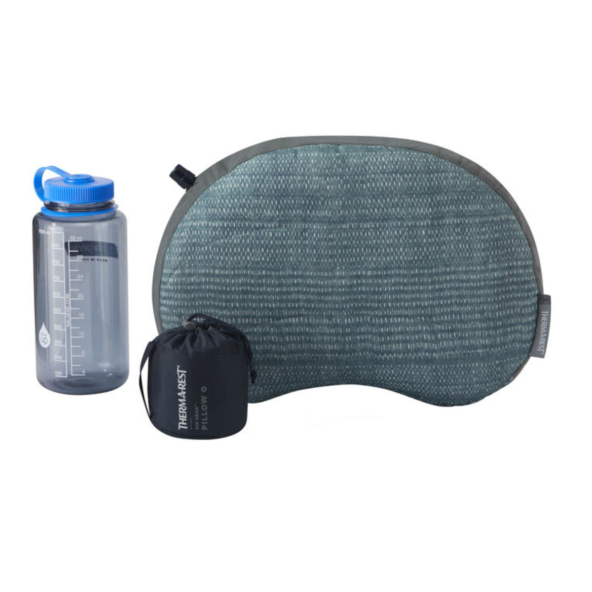Thermarest Air Head in Blue next to nalgene