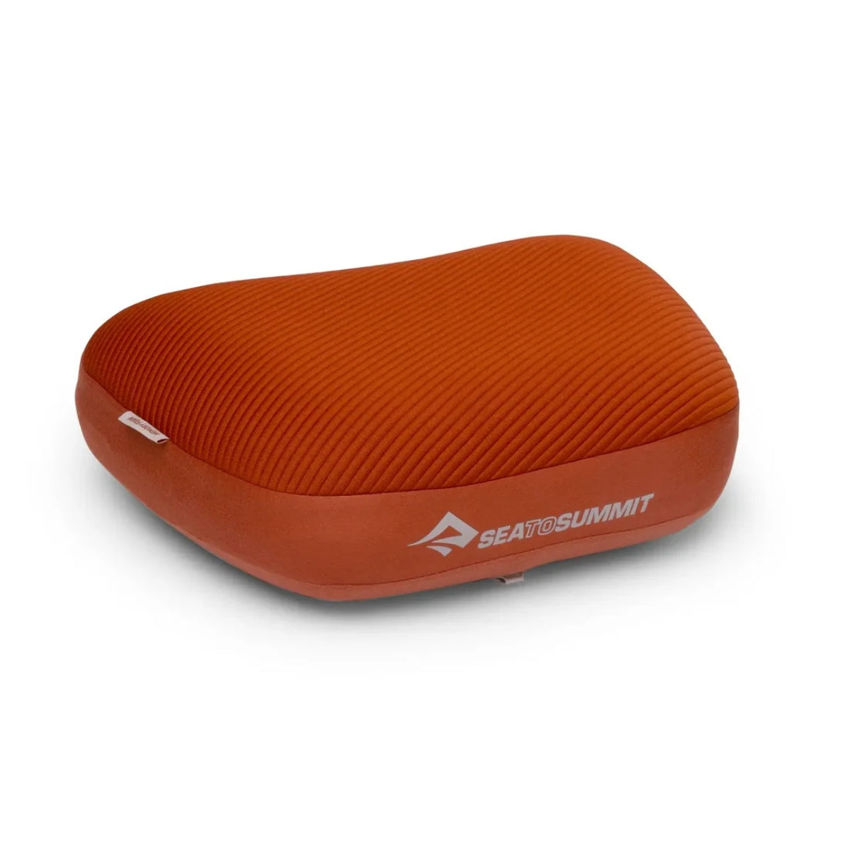 Orange travel pillow with Sea to Summit logo on a white background