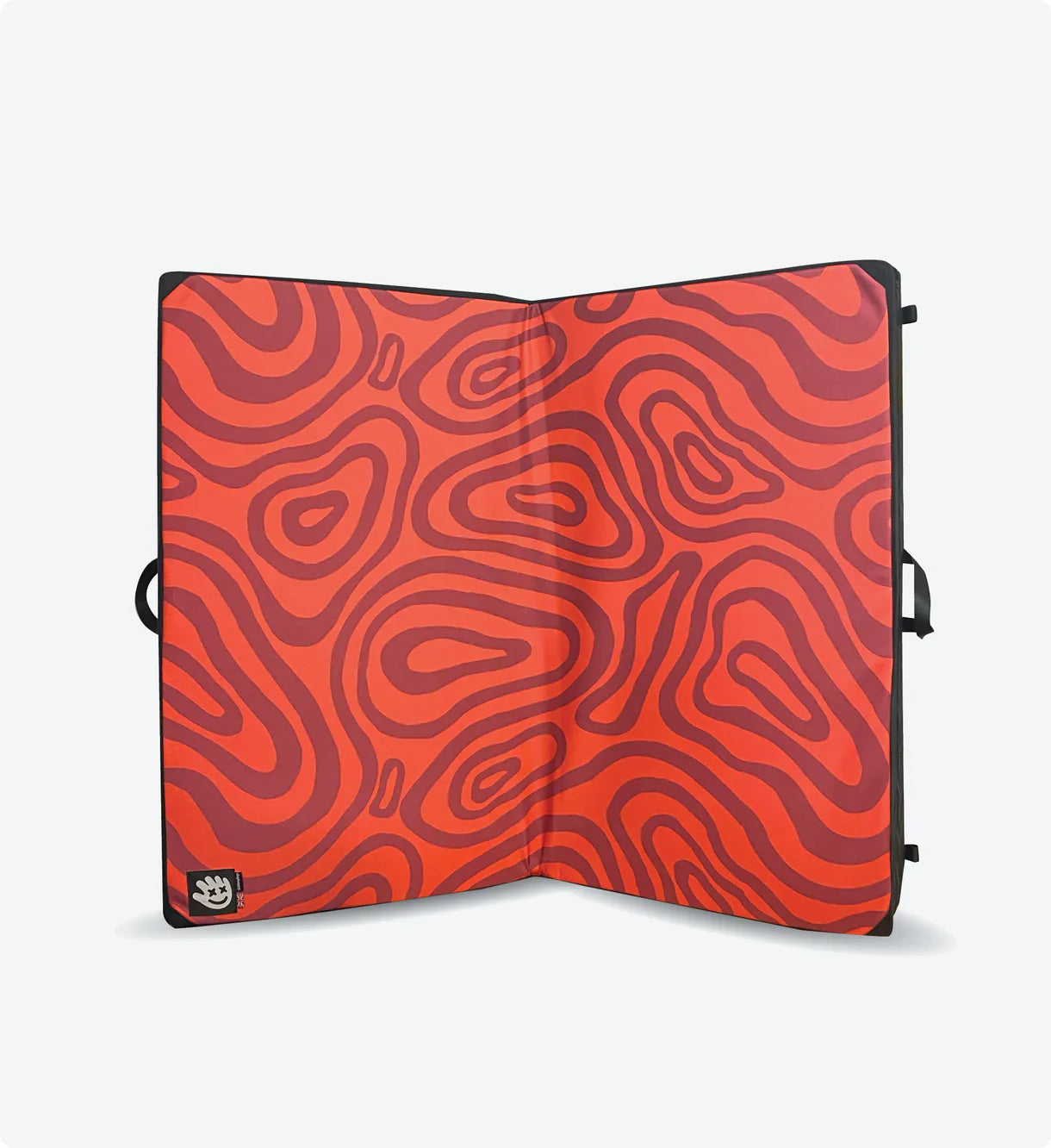 Red and black patterned seat pad on a white background