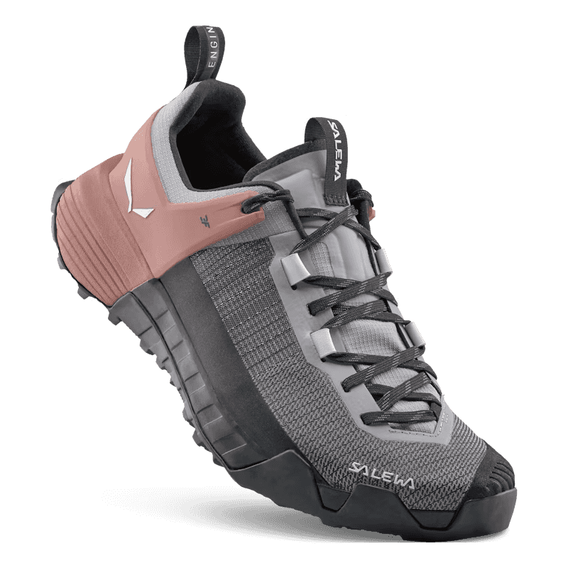 Gray and pink hiking shoe with Salewa branding on a transparent background