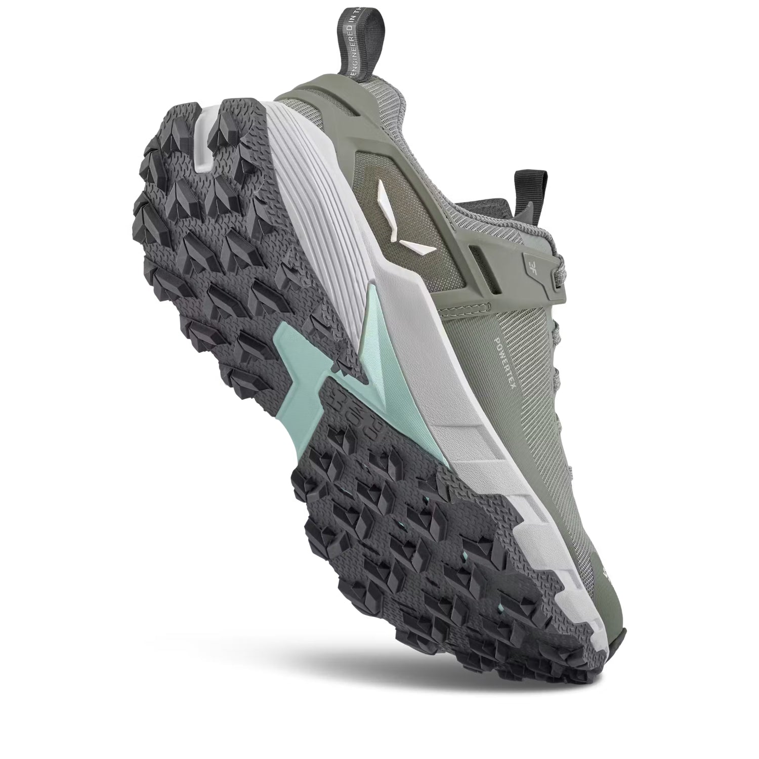 A salewa trail walking shoe in green and grey on a white background