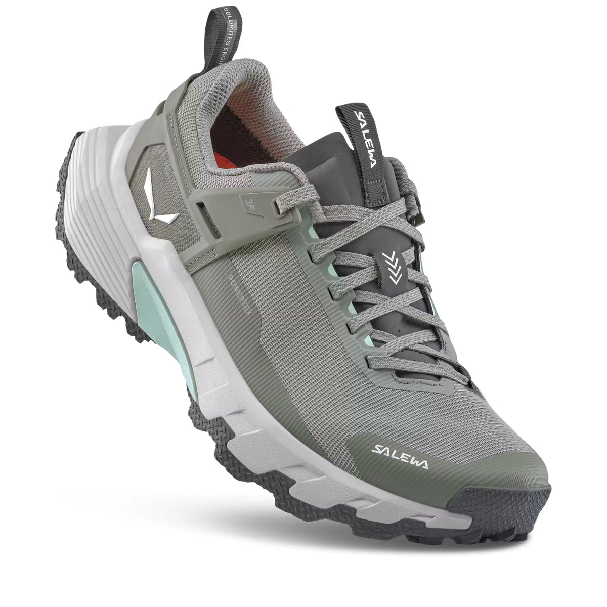 A salewa trail walking shoe in green and grey on a white background
