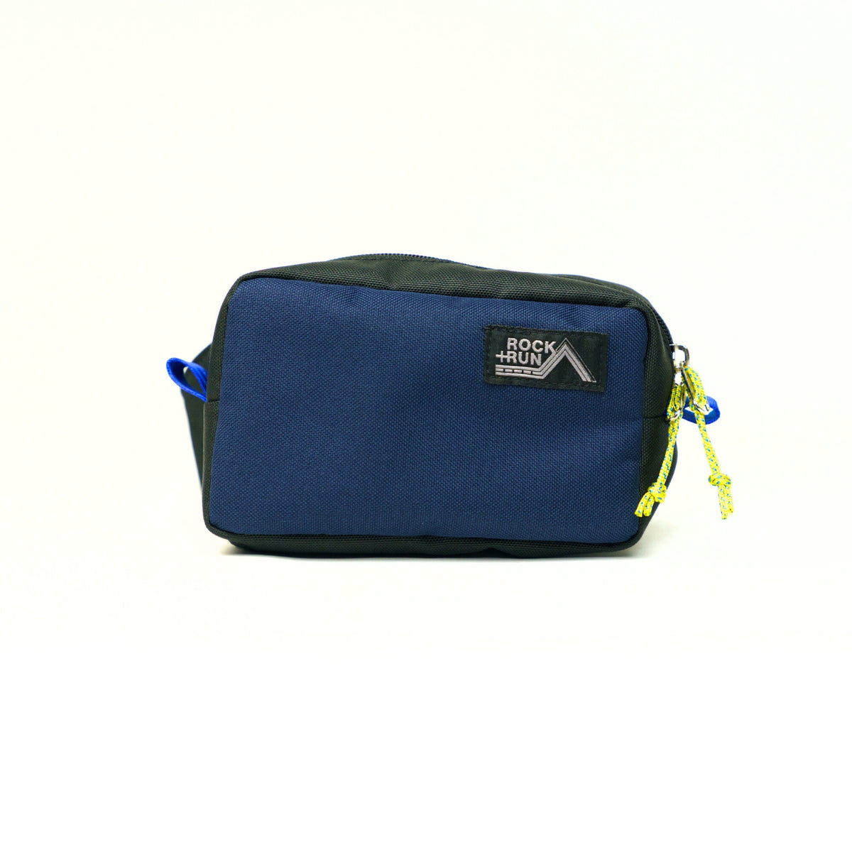 Rock+Run Drone Pack travel waist pack in navy and black with yellow zipper pulls, ideal for carrying travel essentials like passport and phone.