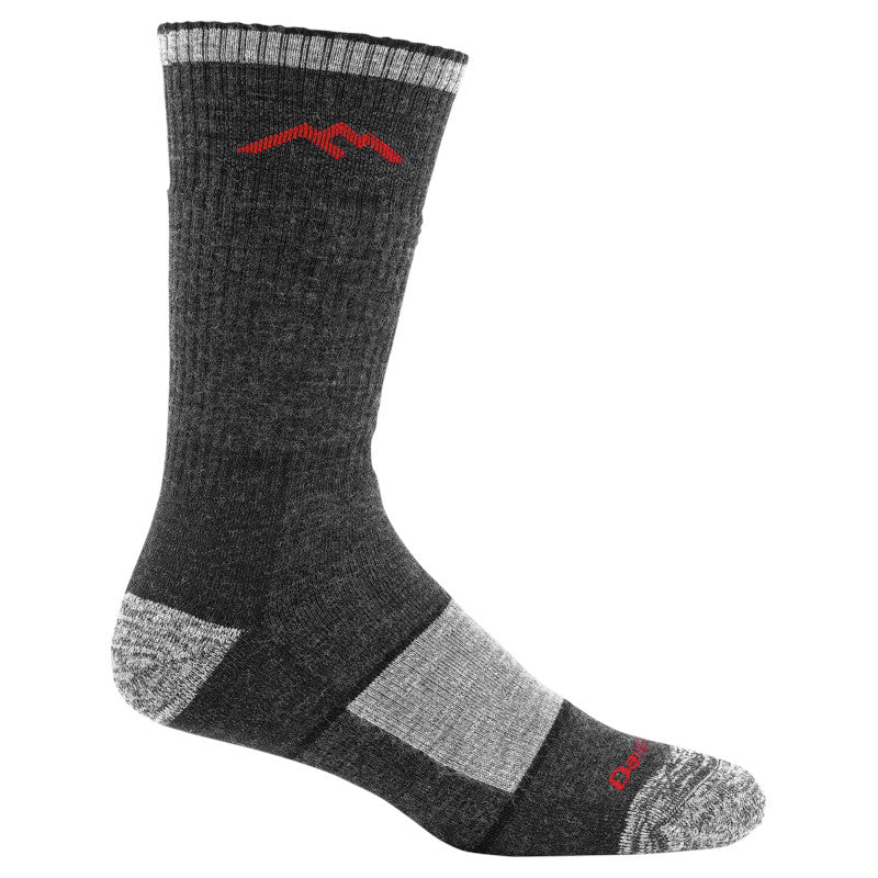 Multicolored sock with mountain design on a white background