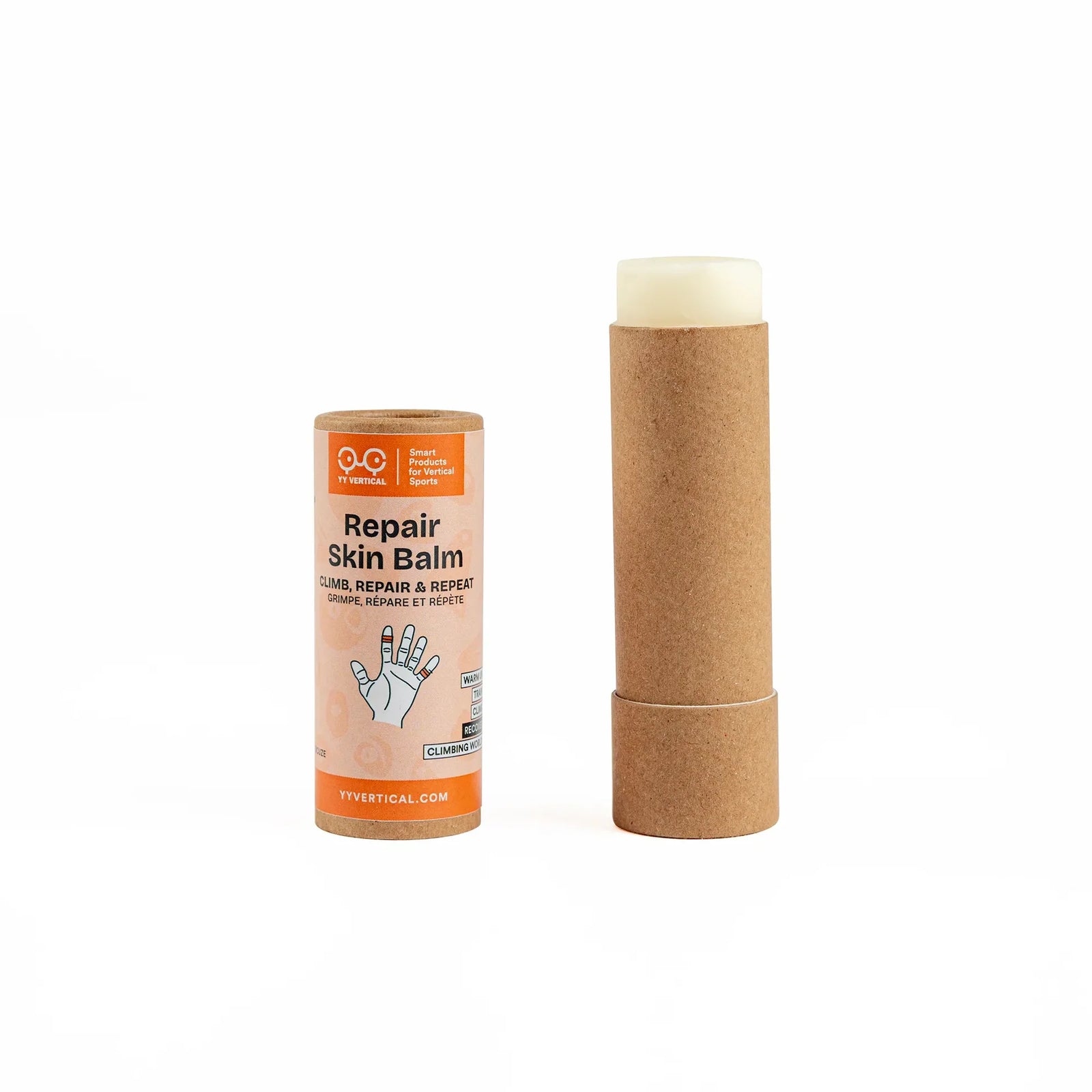 A tube of Repair Skin Balm shown next to its cardboard packaging on a plain white background. The balm stick has a light beige color visible at the top, and the tube is made of brown kraft paper.