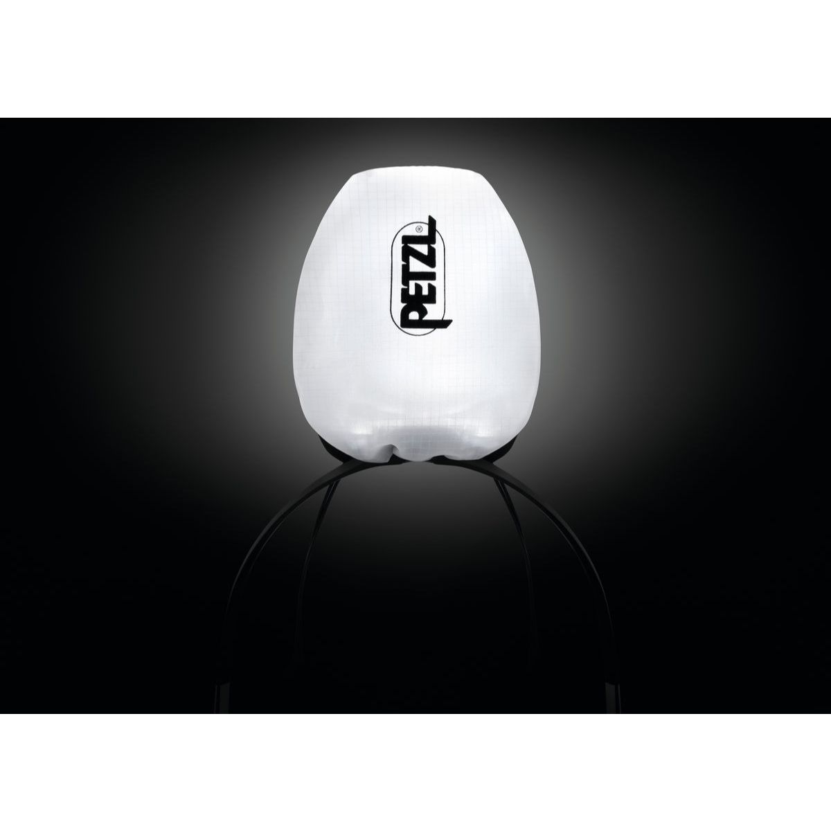 Petzl IKO in white and black showing case that doubles as lamp