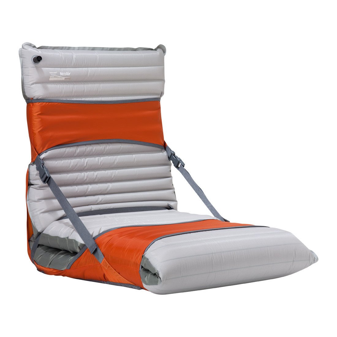 Thermarest Trekker Chair Kit 25, shown in use with a grey sleeping mat, kit in orange colour