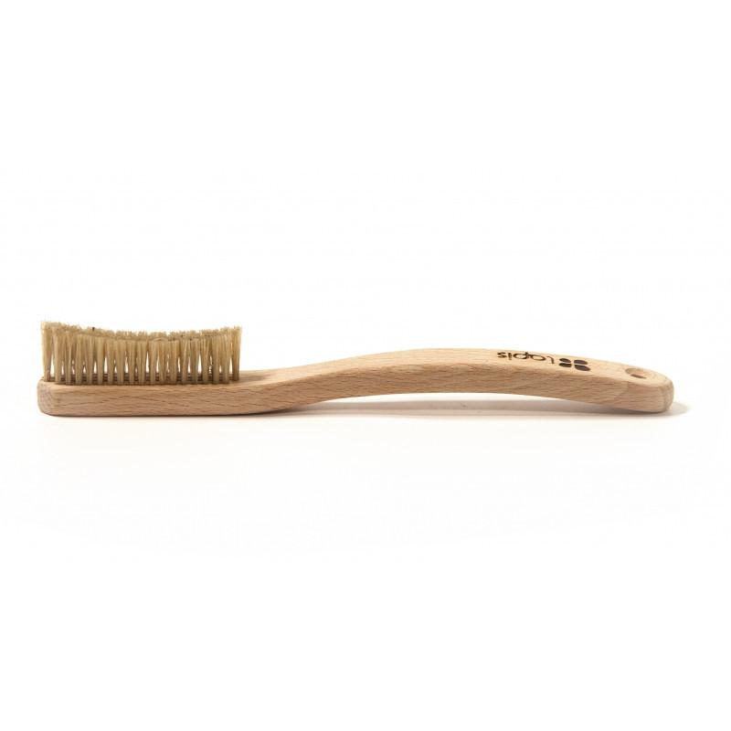 Lapis Wooden bouldering Brush, shown laid flat on white surface