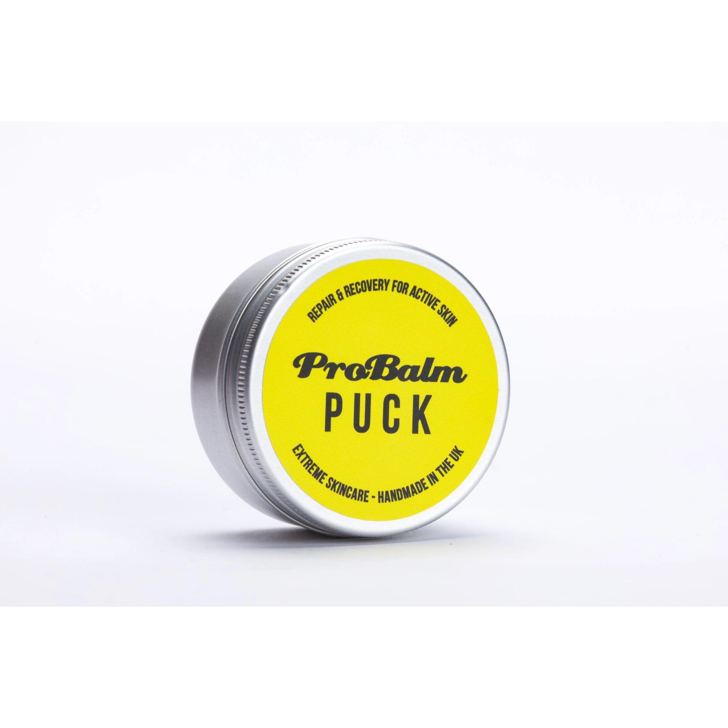 ProBalm Puck 14g, shown in tub with lid half off